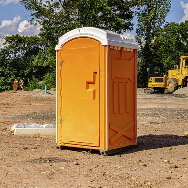 what is the cost difference between standard and deluxe portable restroom rentals in Newfolden